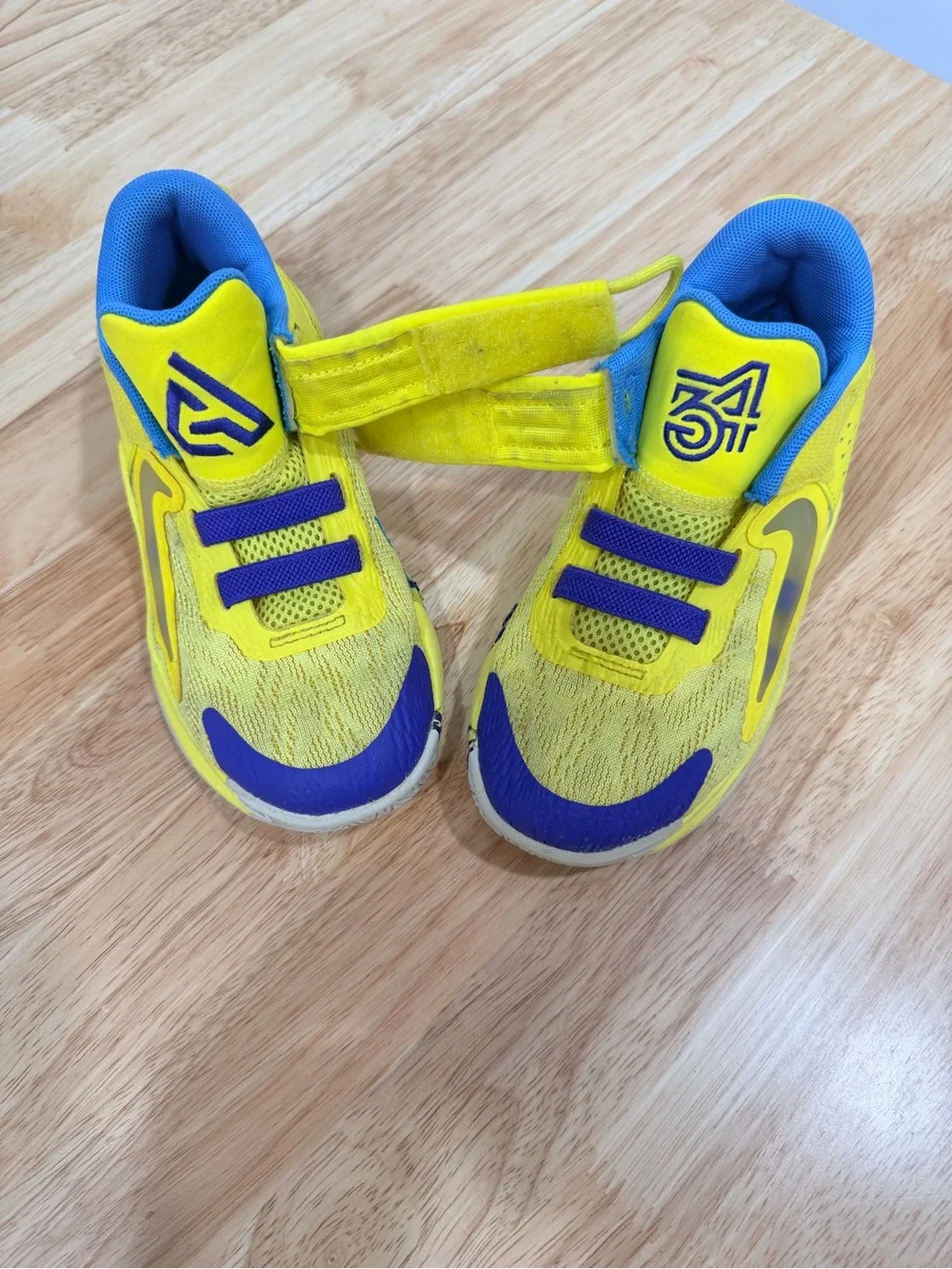 Nike Kids Yellow Sneakers with Blue Accents